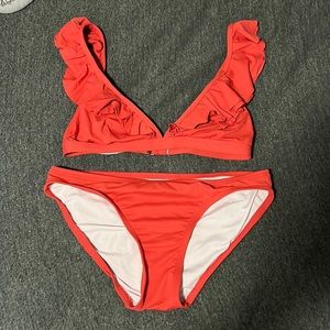 Michael Kors two-piece swimsuit. XS but could fit a S. Red/pink